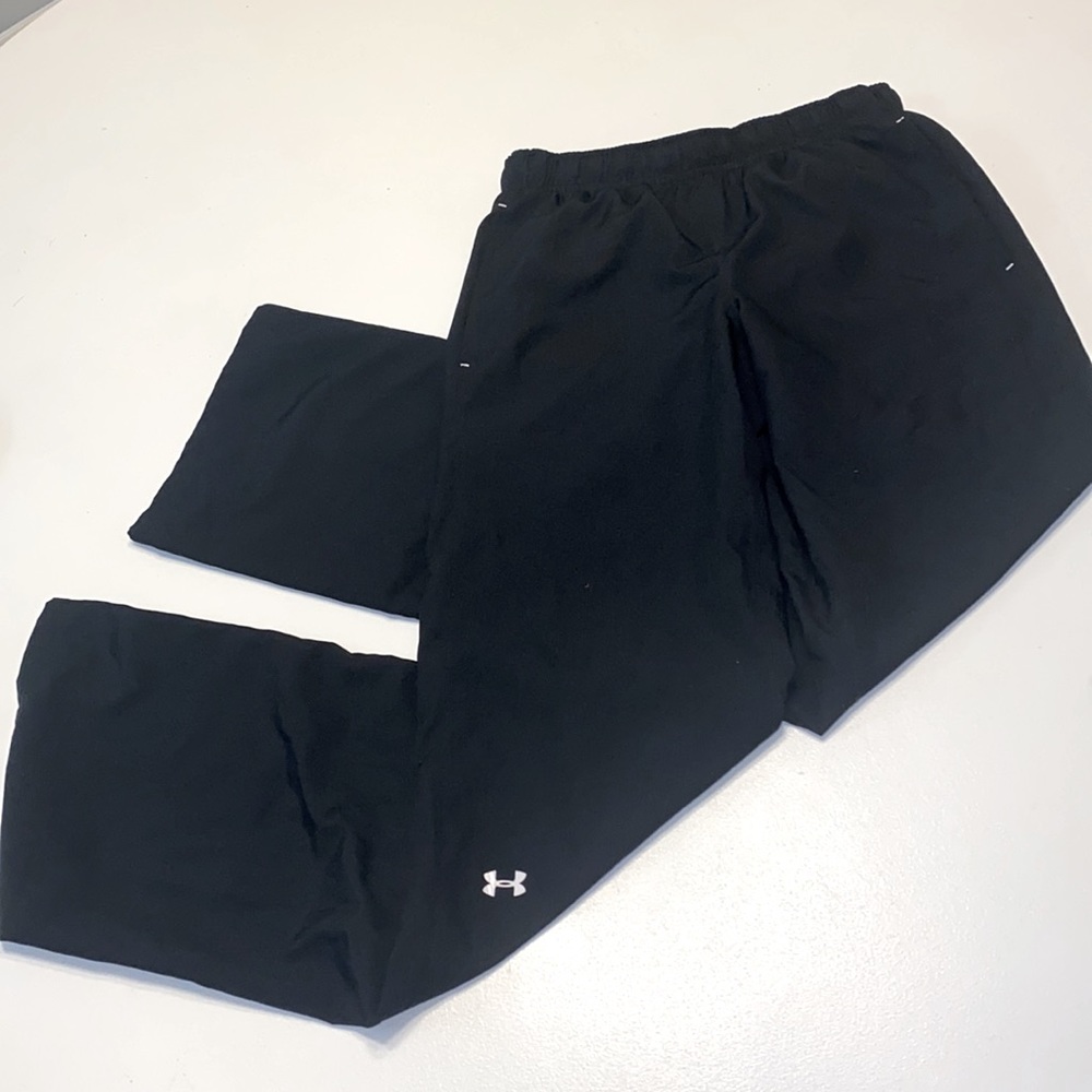 Women’s Under Armour wind pants. Size XS. Black.